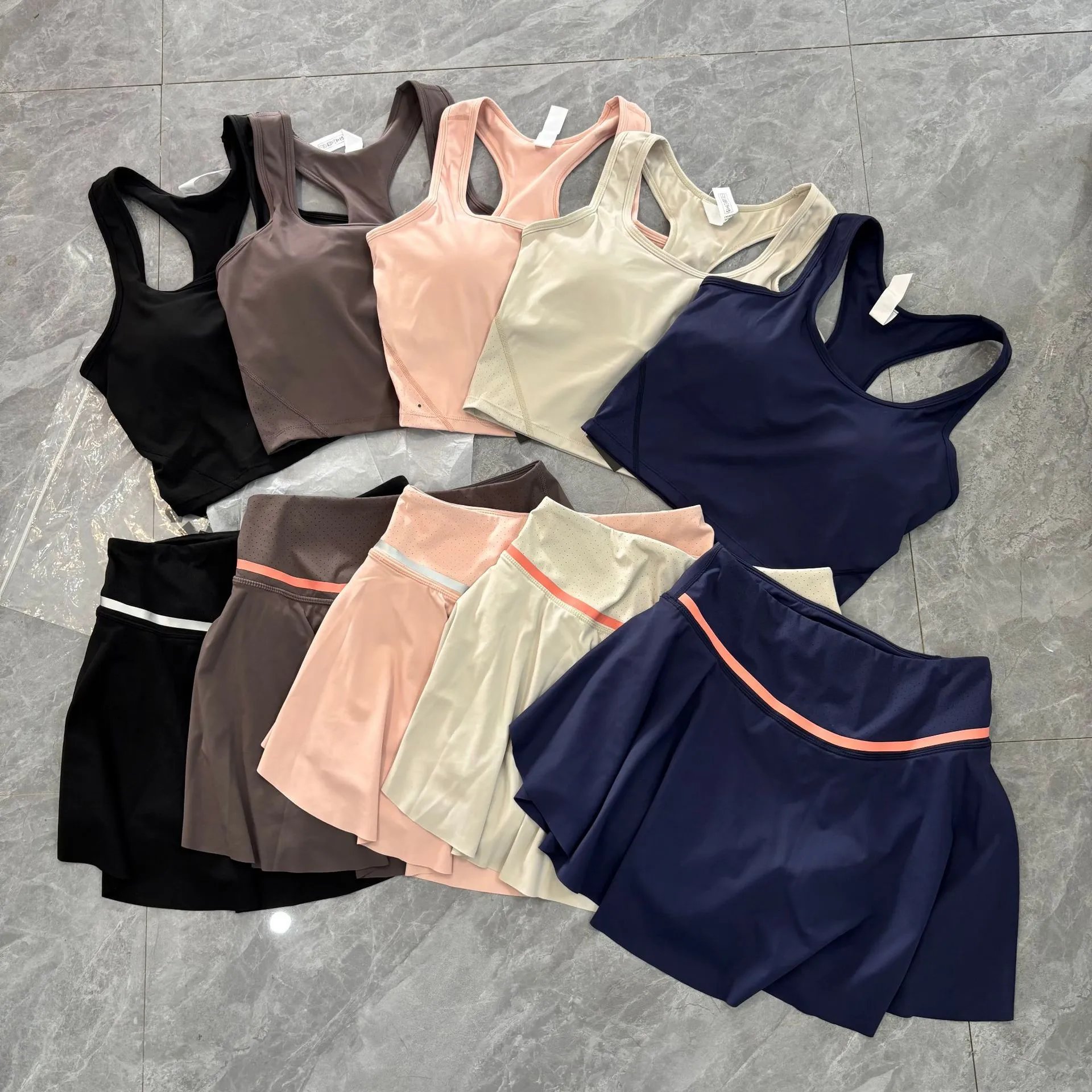 European and American cross-border foreign trade edition tennis sports skirt pleated skirt anti-walking ladies yoga vest set with chest cushion