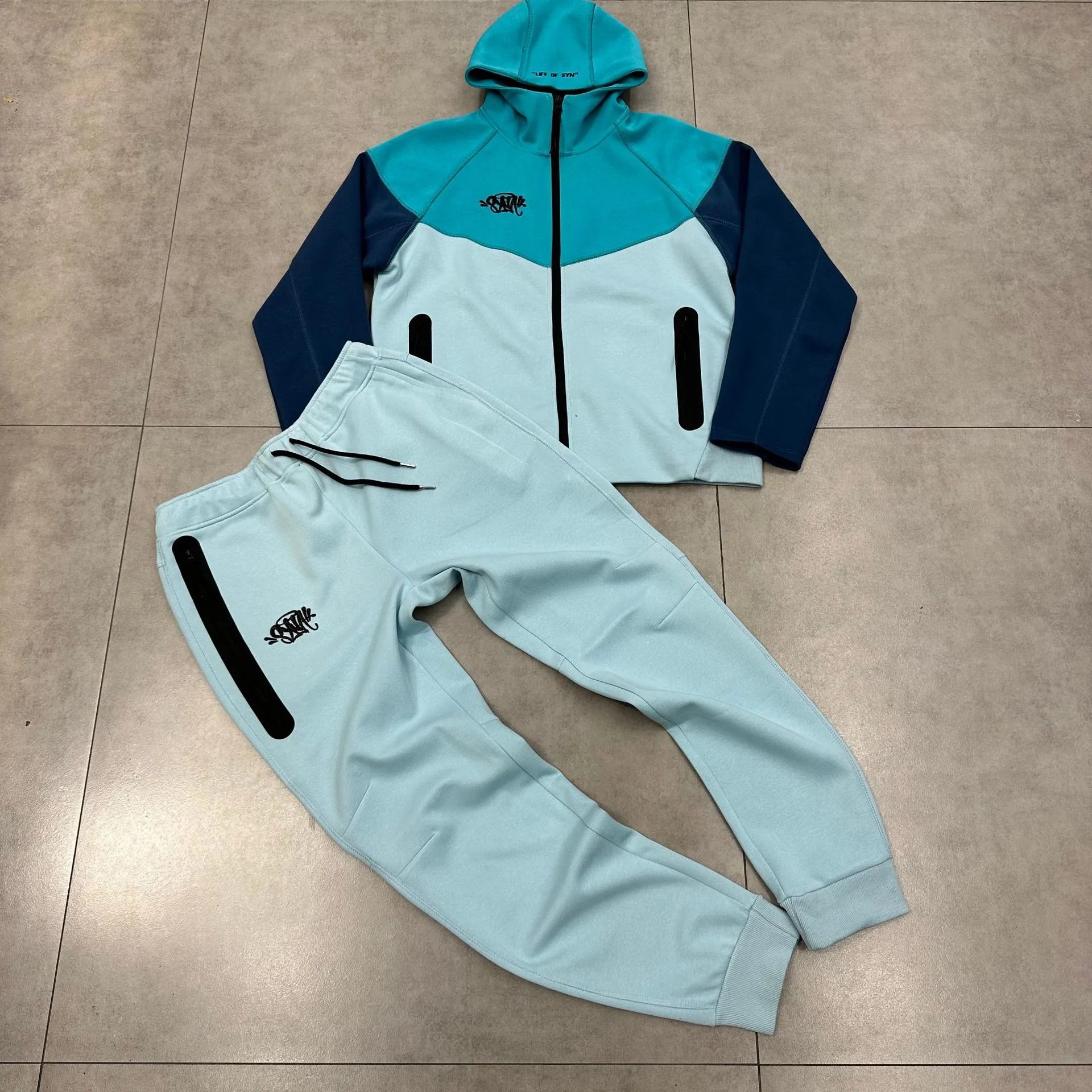 Nike Sportswear Tech Fleece x Central Cee Syna World