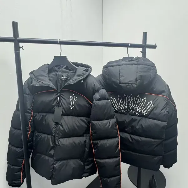 Trapstar Black Puffer Jacket with Orange Trim and Gothic Logo - 1