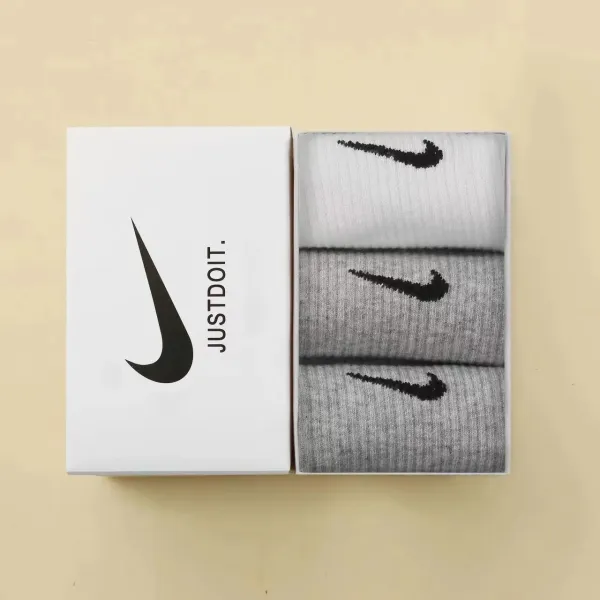 Nike Swoosh Logo Crew Socks White and Gray Socks - 1