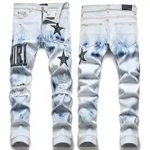 Amiri Star Print Distressed Bleach Wash Jeans - 1