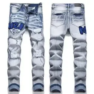 Maison Margiela Replica Logo Patchwork Distressed Light Blue Jeans - 1