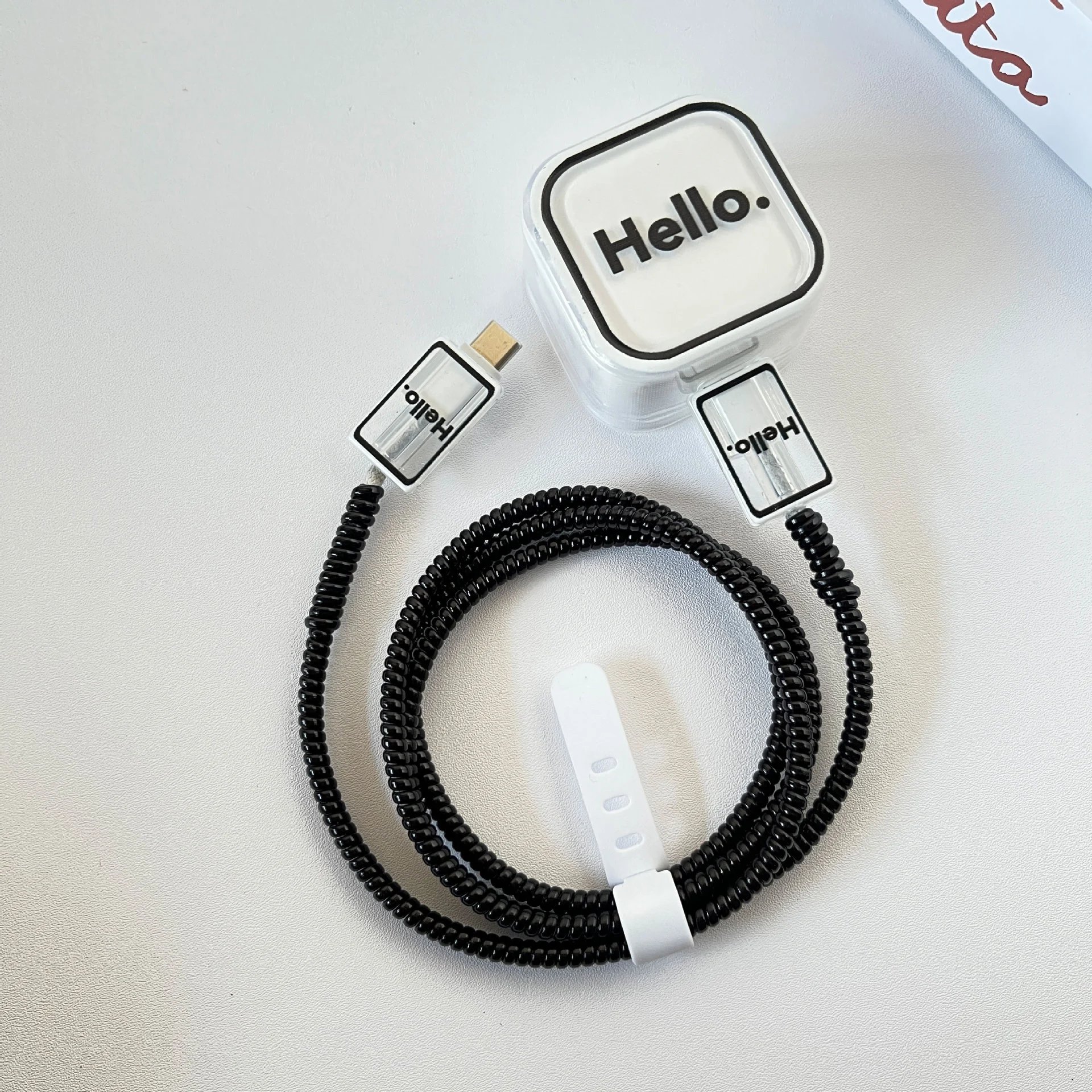 Design Hello. Coiled Cable USB-C to Lightning Black Phone Accessory Phone Accessories Cable