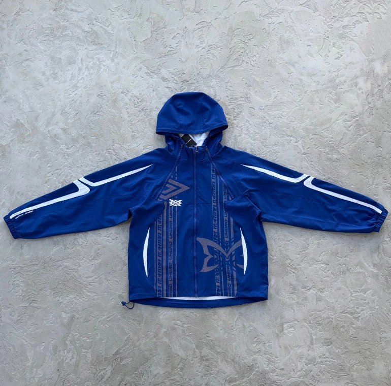 MUTA Jackets Hooded zip-up shell jacket with multiple zip pockets — Reflective jacket in blue