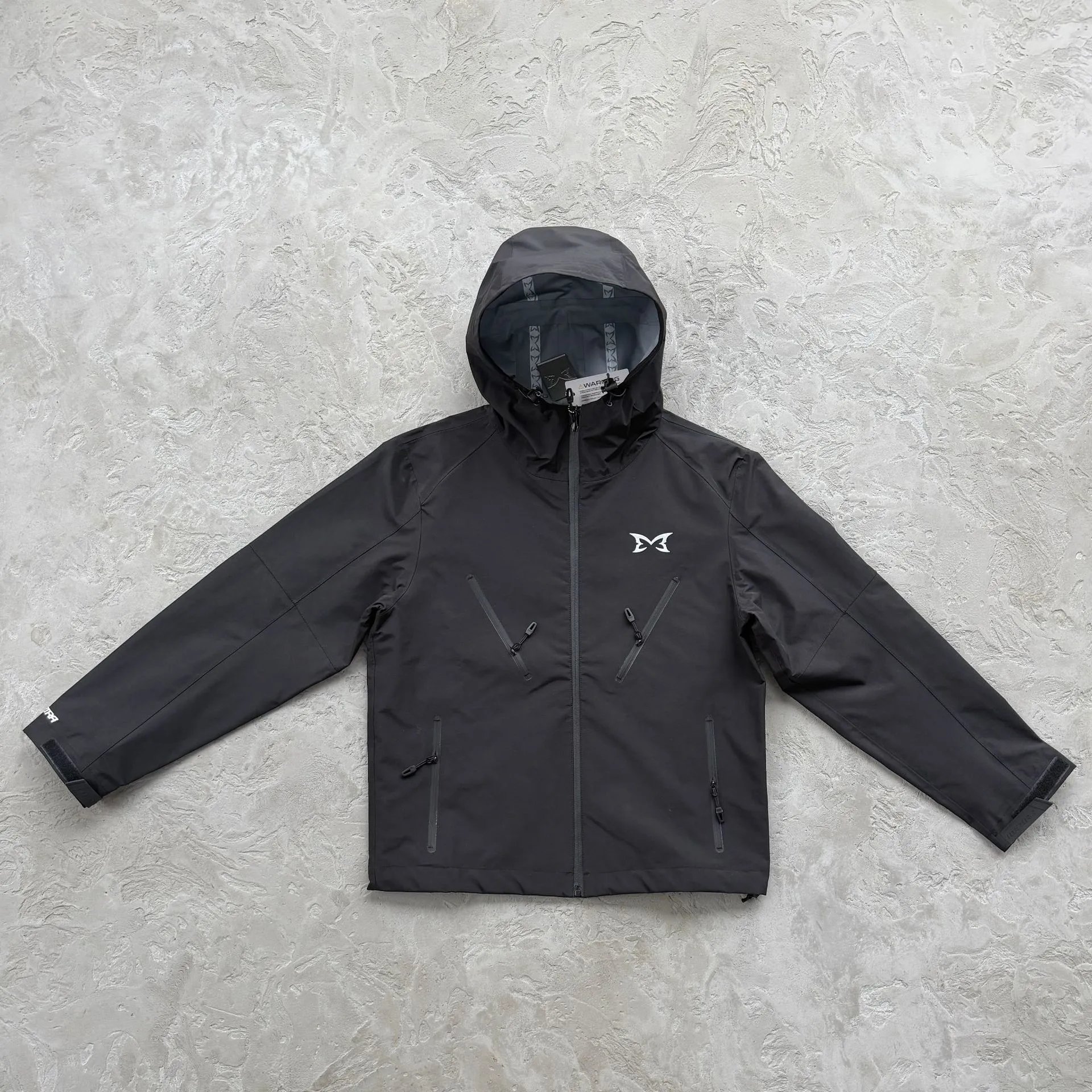 MUTA Jackets Hooded zip-up shell jacket with multiple zip pockets — Black 2.0