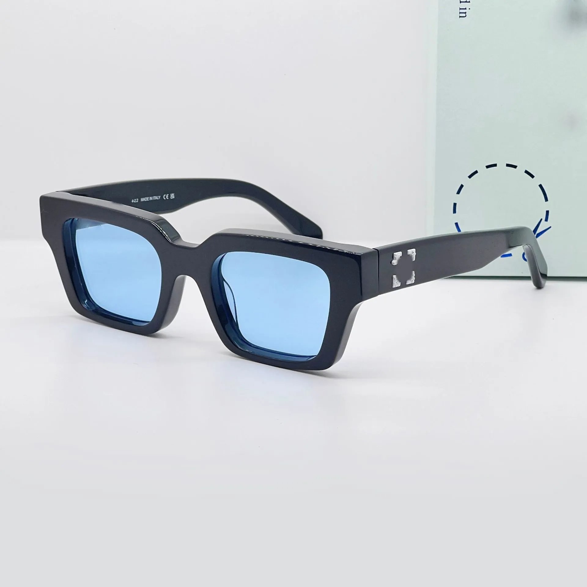 Black Frame Transparent Blue Lens White Text (No Case)