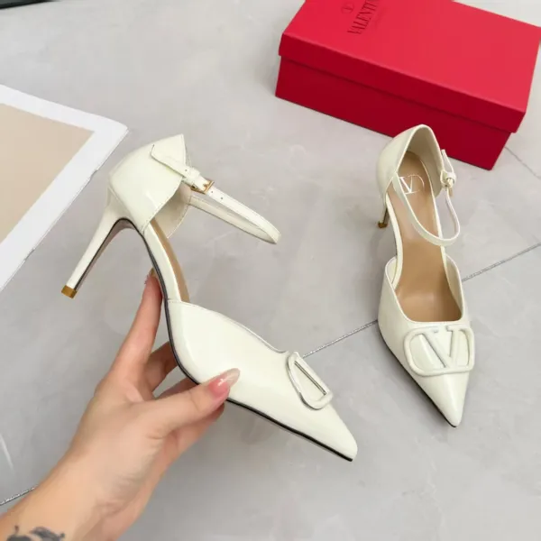 Valentino Garavani VLogo Pointed-Toe Stiletto Heels in Off-White - 1