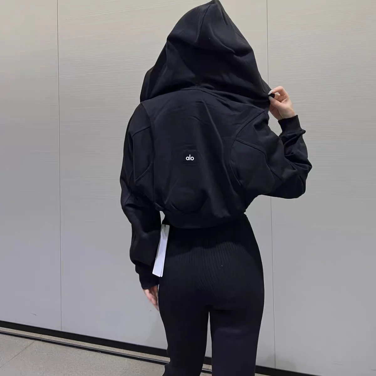 Alo Yoga Cropped Hoodie Black + High-Waisted Leggings Black + Chunky Sneakers Gray - 7
