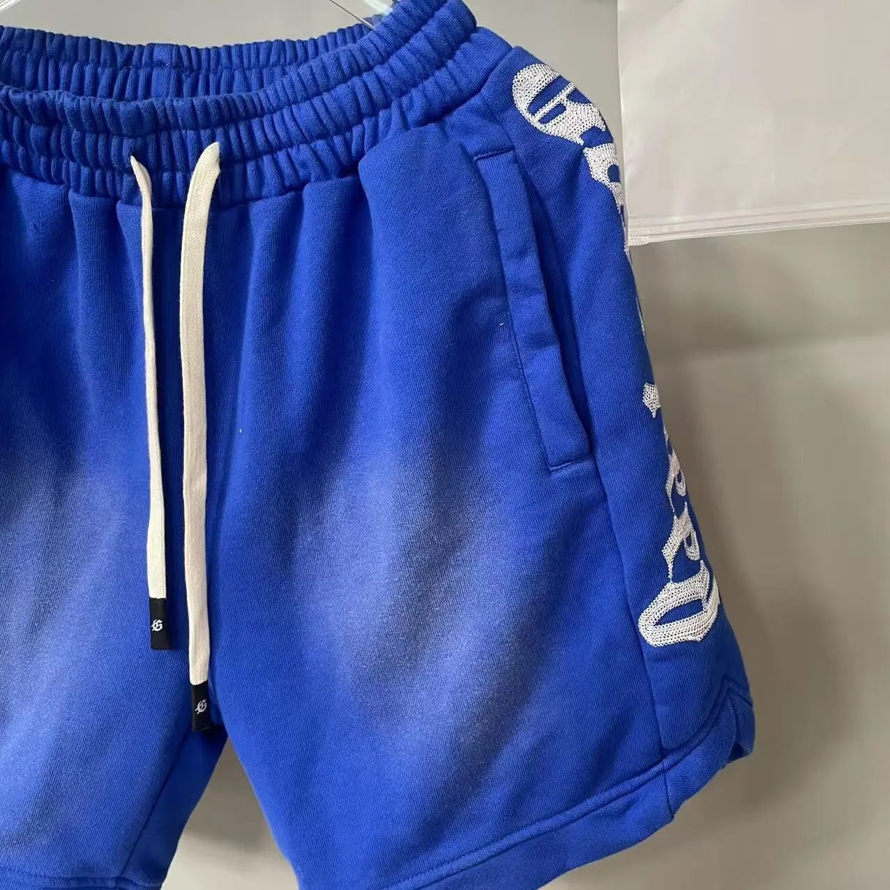 hA. Embroidered Script Shorts Blue - 17