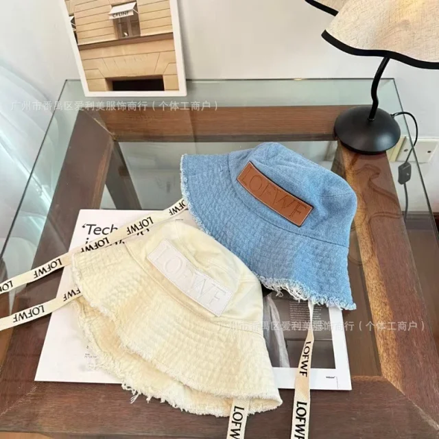 Unbranded Hats Frayed-brim bucket hat with logo-style patch and printed chin strap product detail image 1