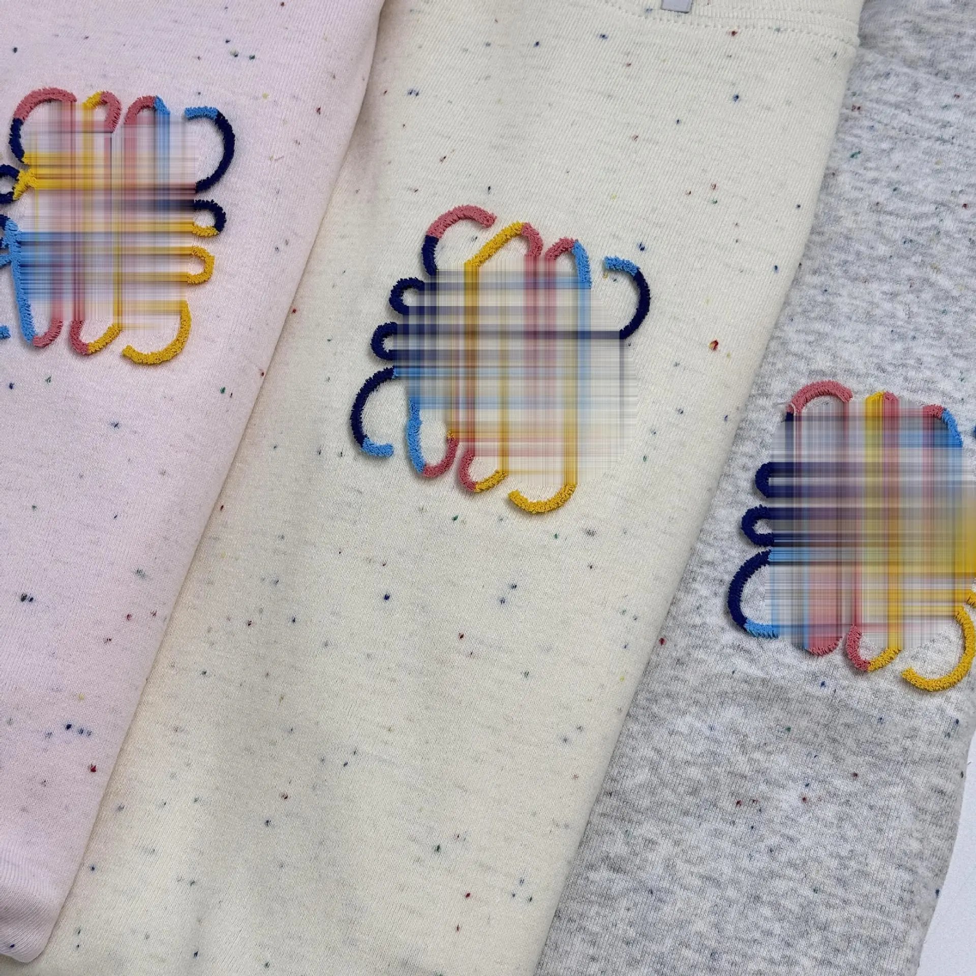 Design Speckled Pink T-Shirt with Abstract Rainbow Logo - 12