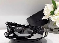 Black framed silver slice