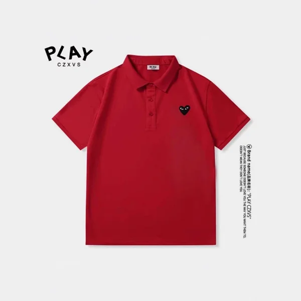 A red polo shirt inspired by Rei Kawakubo's Play series.