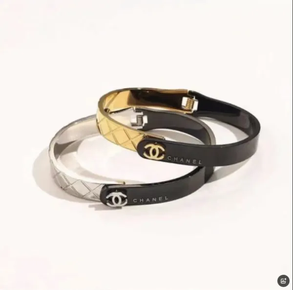 Chanel Mademoiselle Bracelet Set in Black, Gold, and Silver - 1