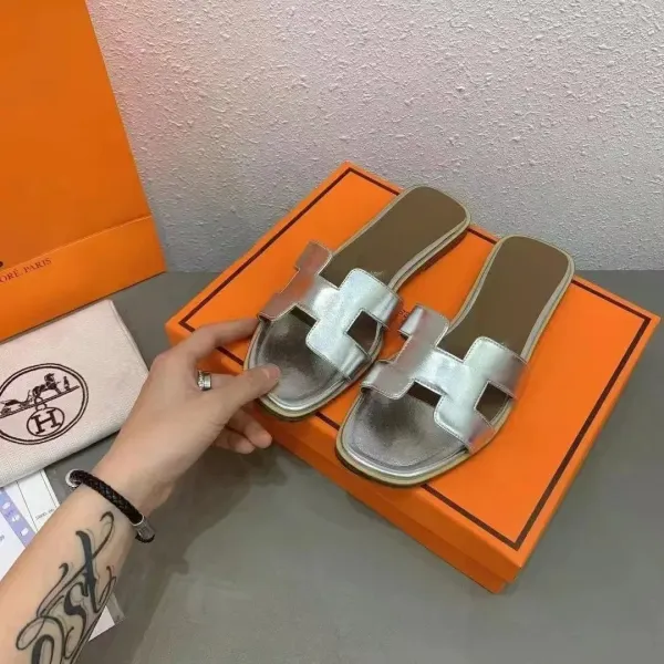 Hermès Oran Slide Silver Metallic Sandals - 1