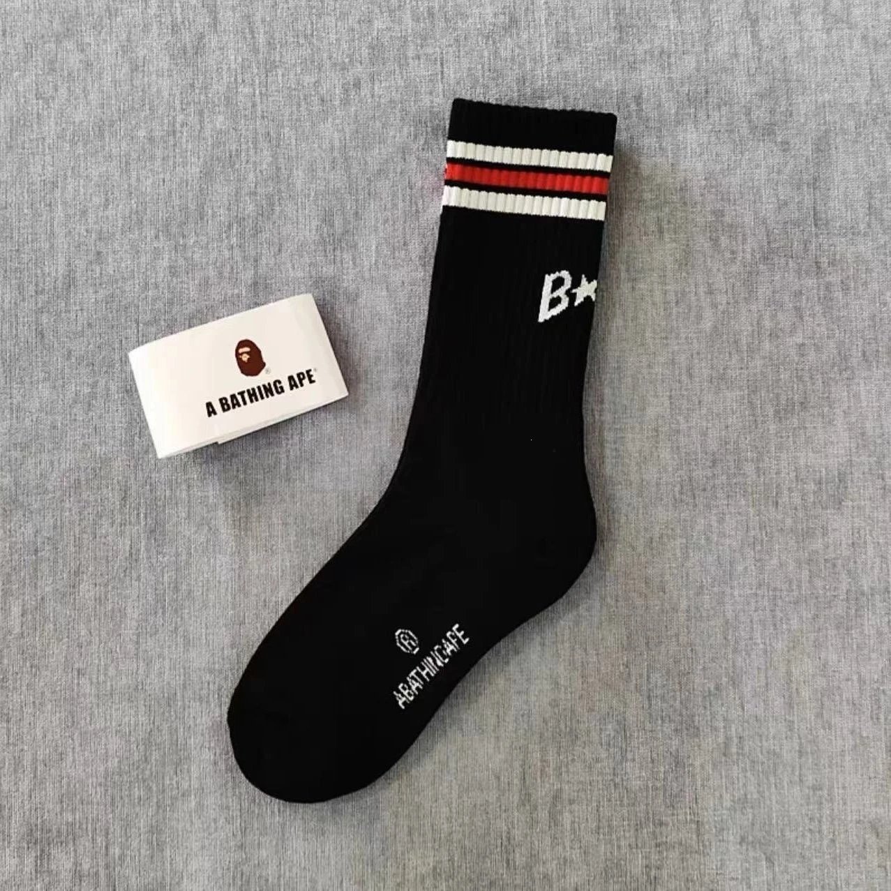 A Bathing Ape Socks Ribbed crew with logo graphics and striped cuffs — 20