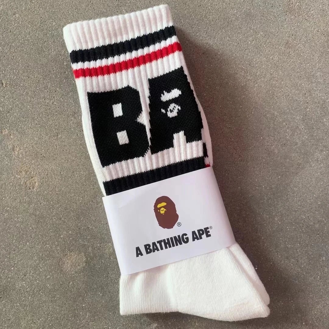 A Bathing Ape Socks Ribbed crew with logo graphics and striped cuffs — 7