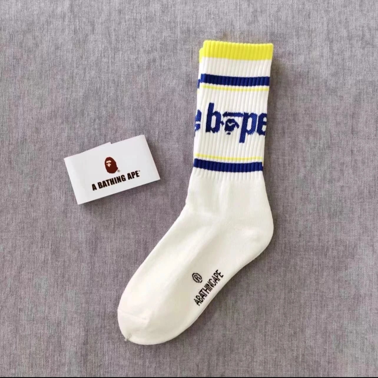 A Bathing Ape Socks Ribbed crew with logo graphics and striped cuffs — 23