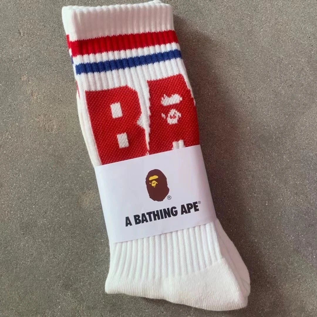 A Bathing Ape Socks Ribbed crew with logo graphics and striped cuffs — 9