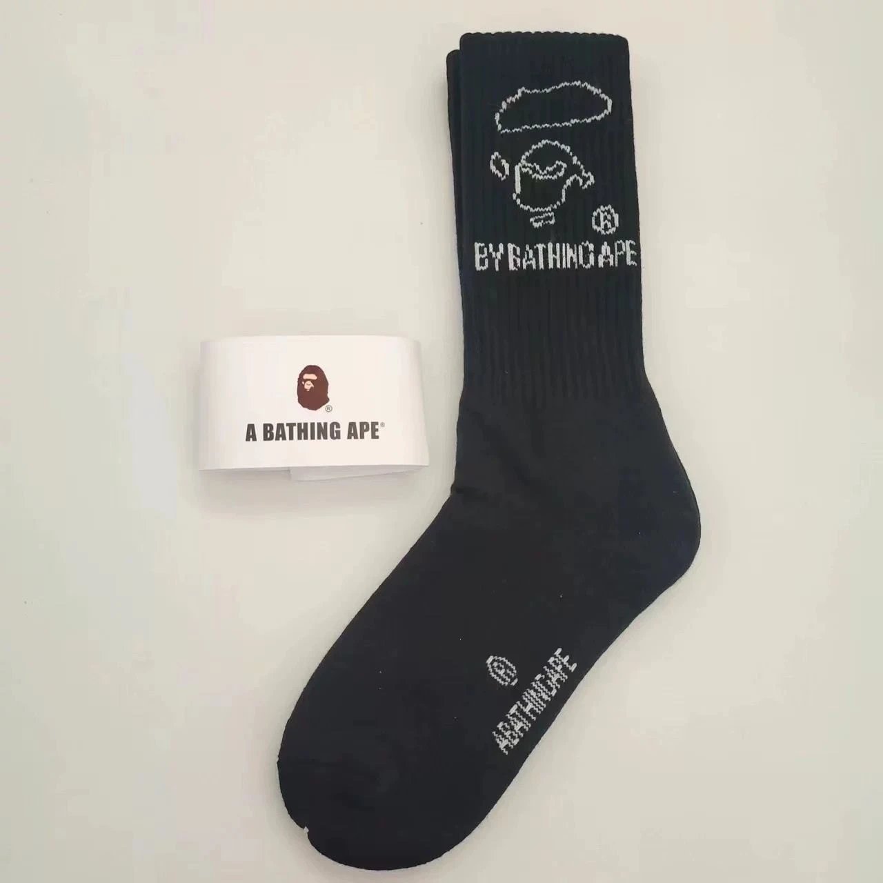 A Bathing Ape Socks Ribbed crew with logo graphics and striped cuffs — 33