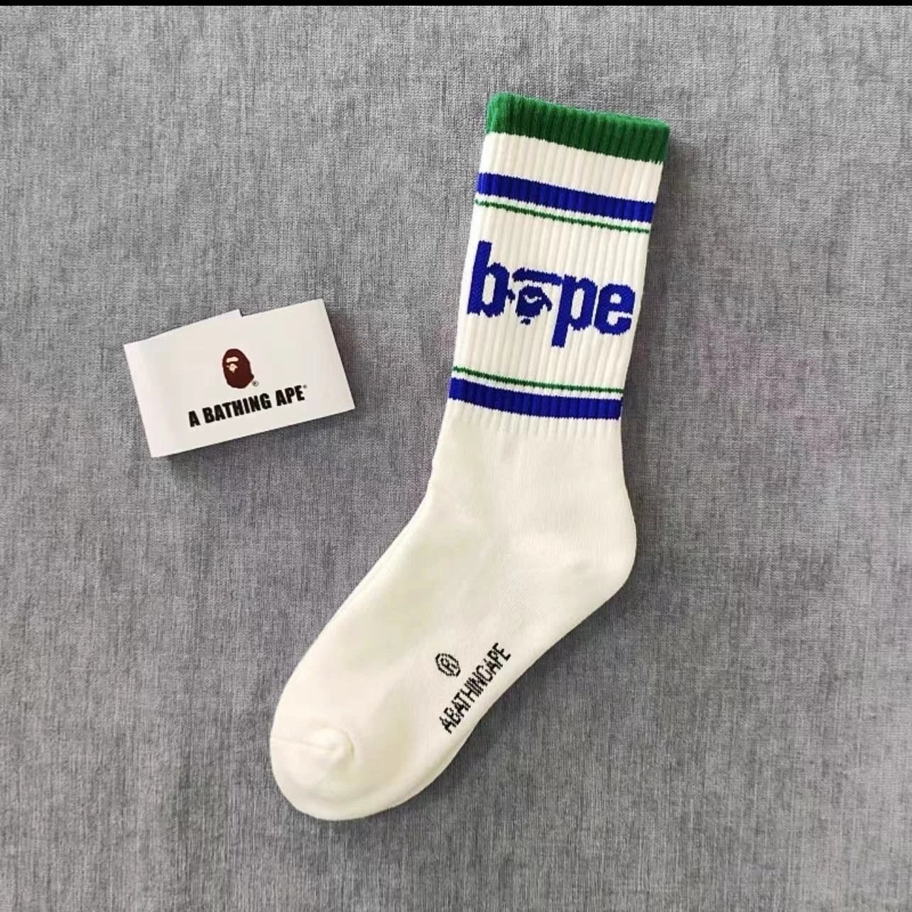 A Bathing Ape Socks Ribbed crew with logo graphics and striped cuffs — 21