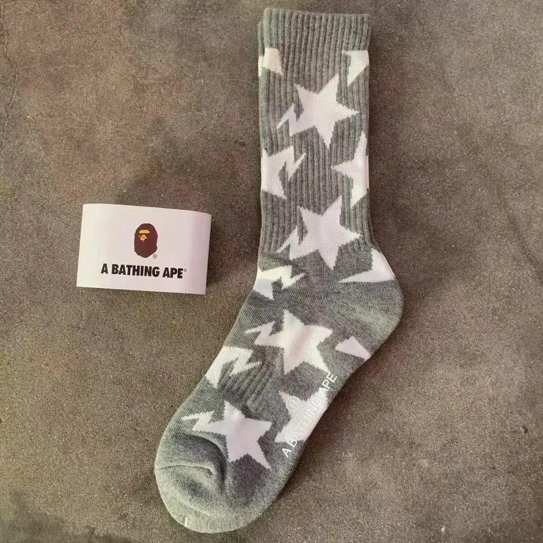 A Bathing Ape Socks Ribbed crew with logo graphics and striped cuffs — 16