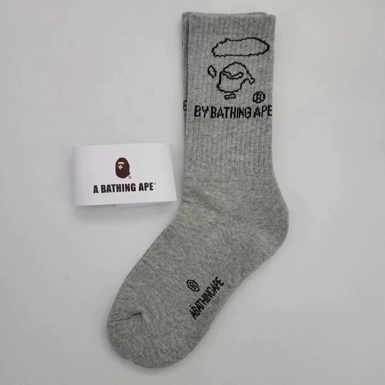 A Bathing Ape Socks Ribbed crew with logo graphics and striped cuffs — 34