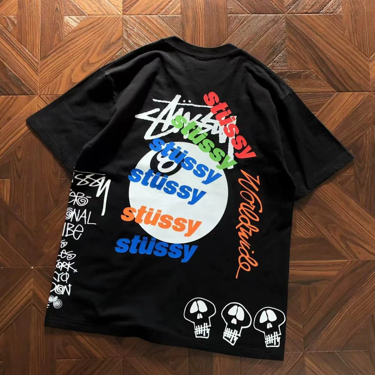 Stüssy T-Shirts Multicolor logo and skull graphic image 2