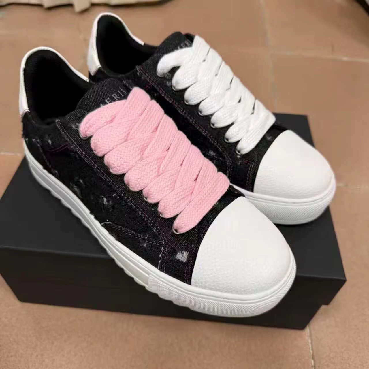 AMIRI Distressed Black Denim Low-Top Sneakers with Pink & White Fat Laces