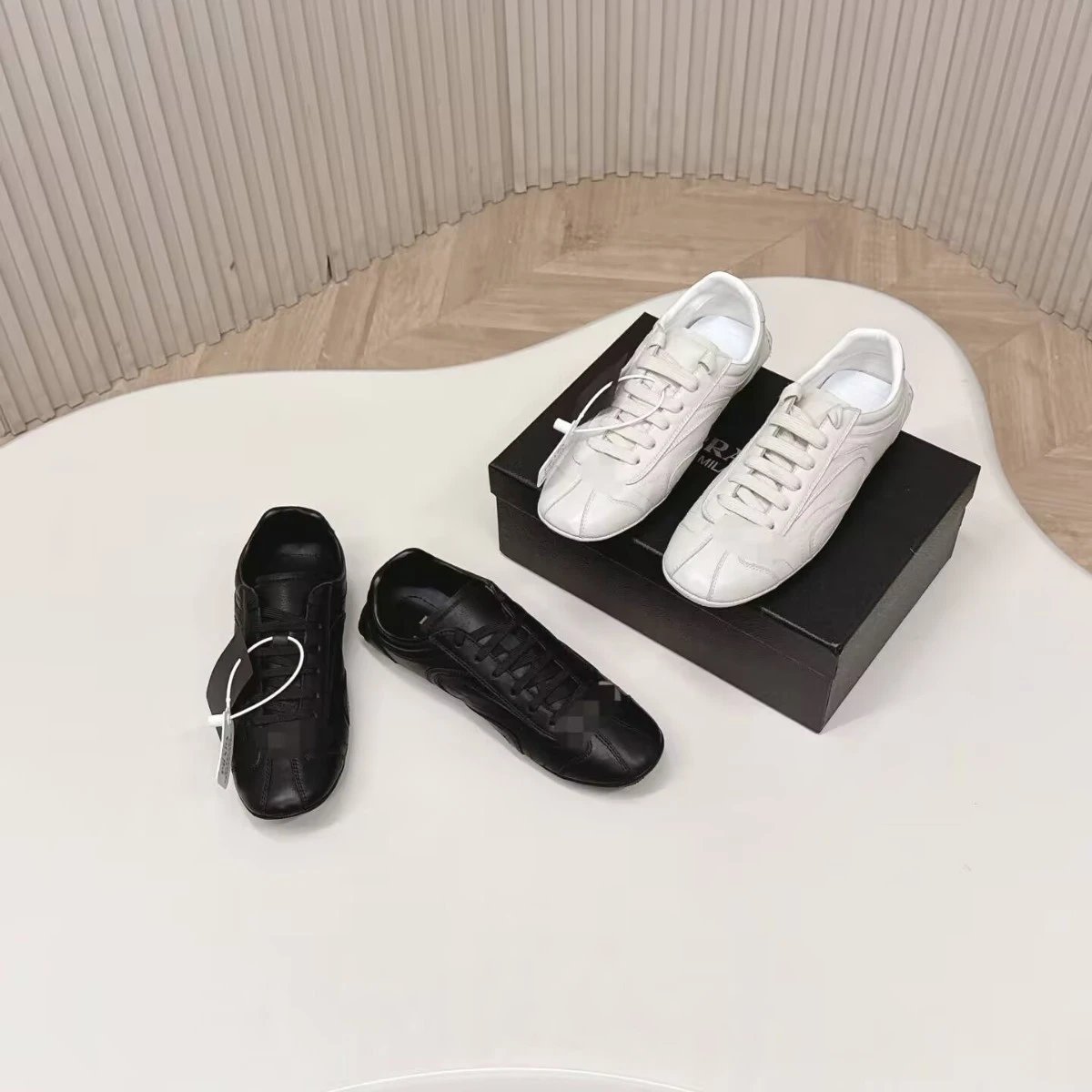 Prada Leather Low-Top Sneakers White and Black Lace-Up German Trainer