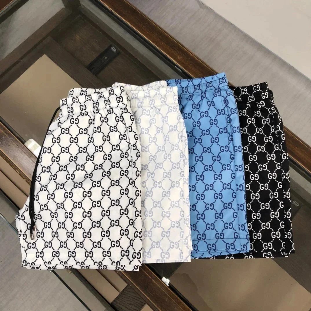 Gucci Black and White Logo Print Shorts