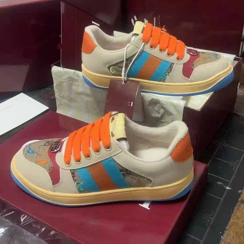 Gucci Beige Low Top Sneakers with Orange Laces