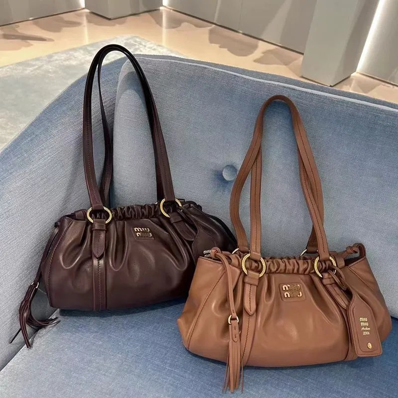 Miu Nuova Borsa Nuvola Borsa Bowling Nuova Borsa a Mano Spalla Ascellare Coulisse Plissettata Moda Versatile Borsa Donna