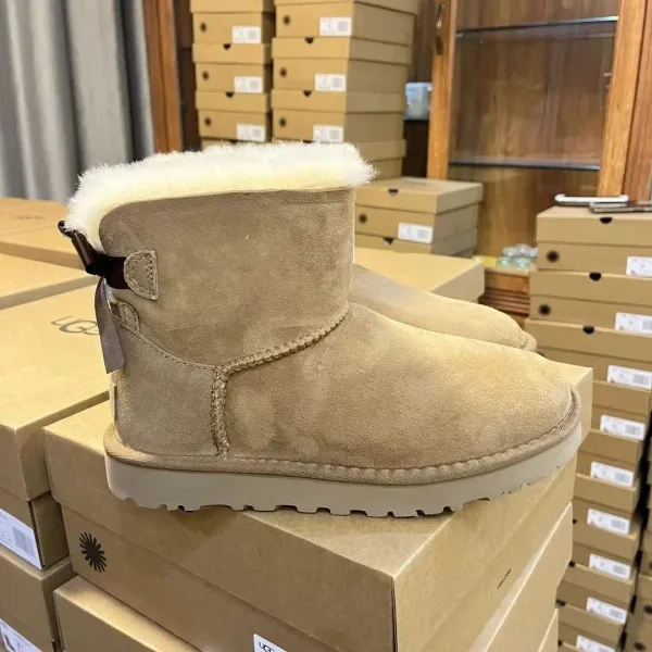 UGG Mini Bailey Bow Beige Suede Sheepskin Boots - 1
