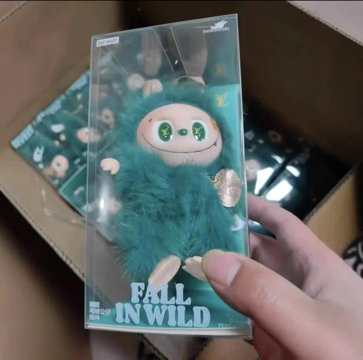 Louis Vuitton x The Monsters Fall In Wild Teal Furry Keychain