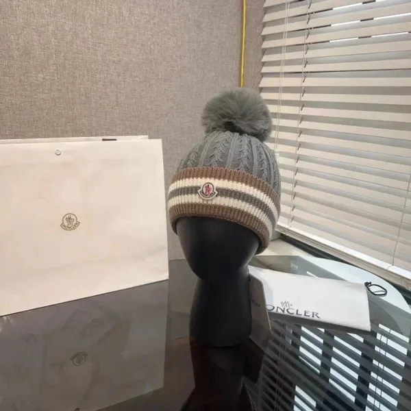 Moncler Cable-Knit Beanie with Pom-Pom in Gray, Brown, and Cream - 1