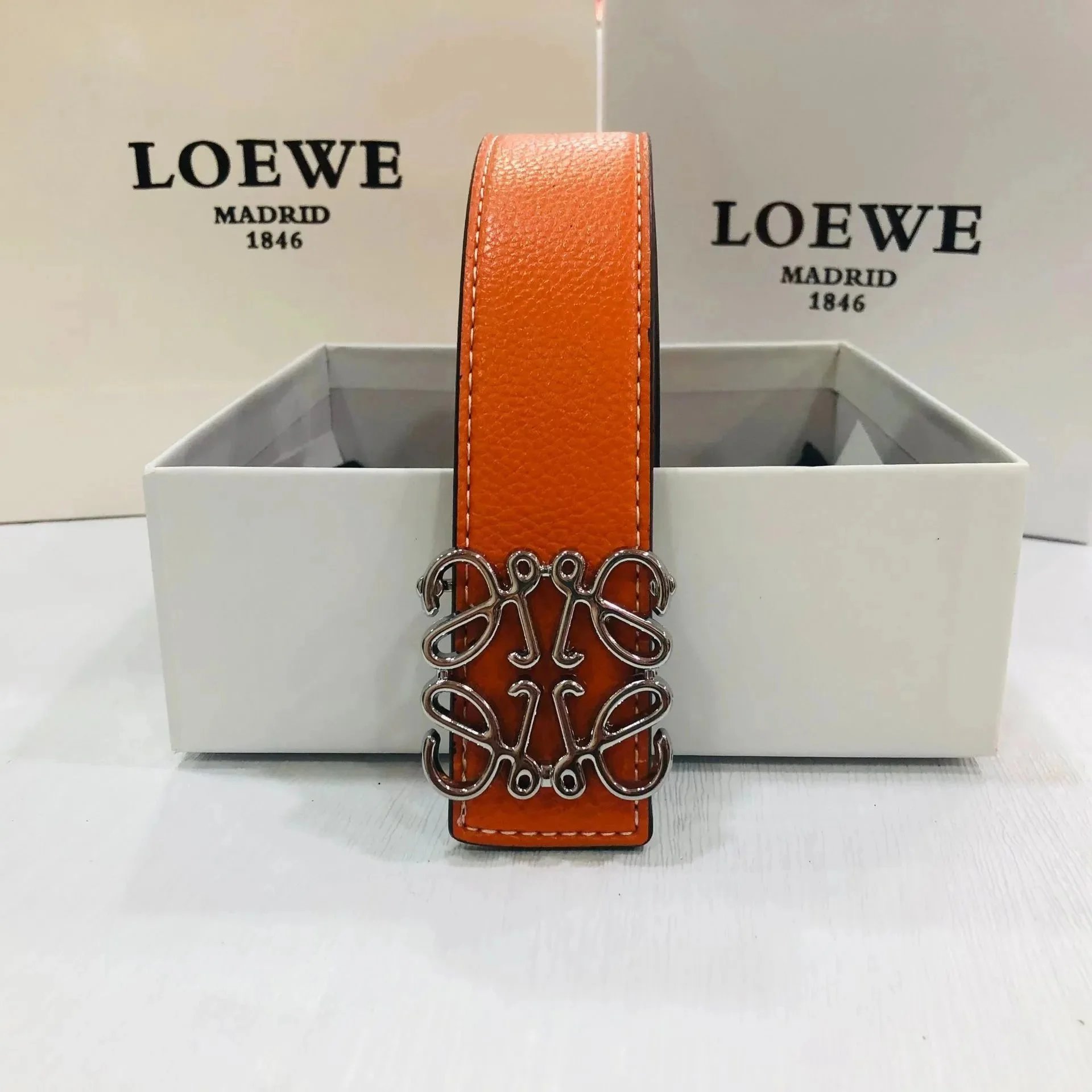 Orange silver buckle