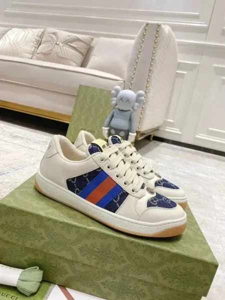 Gucci Rhyton x KAWS White Blue Orange Stripe Sneakers - 1