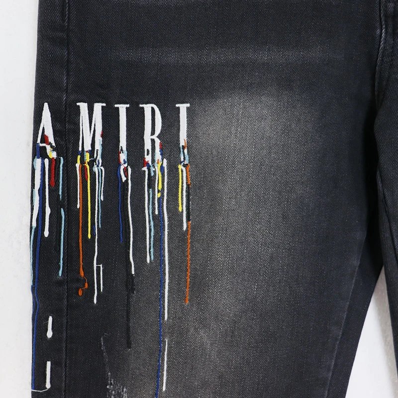 Amiri Paint Drip Logo Distressed Jeans Multicolor