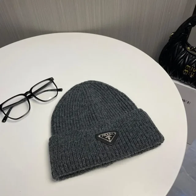 Prada Hats Ribbed knit beanie with triangle logo plaque product detail image 6