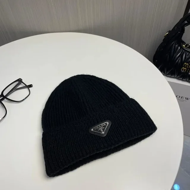 Prada Hats Ribbed knit beanie with triangle logo plaque product detail image 3