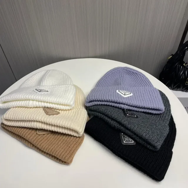 Prada Hats Ribbed knit beanie with triangle logo plaque product detail image 2