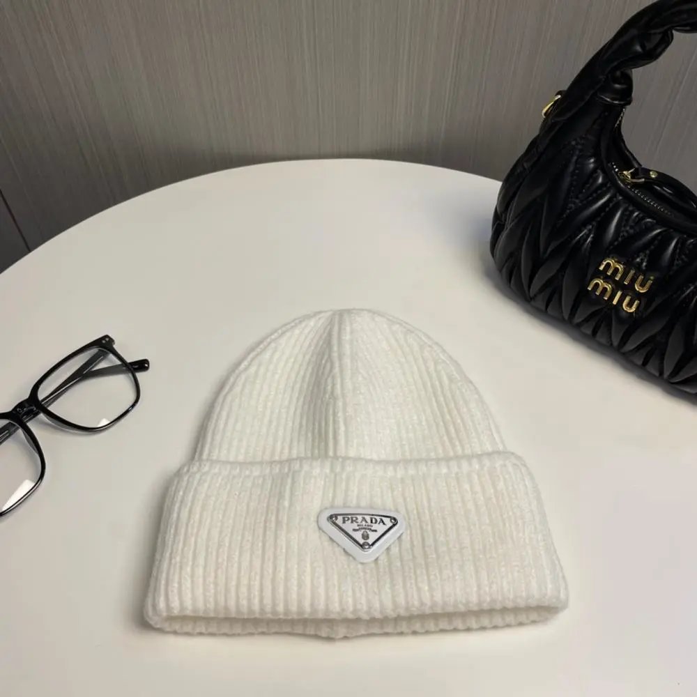 Prada Hats Ribbed knit beanie with triangle logo plaque image 8