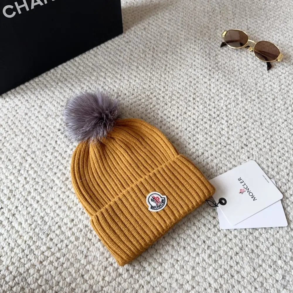Moncler Hats Ribbed knit beanie with pom-pom — Style 5