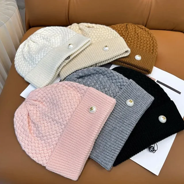 Chanel Hats Knitted cuff beanie with logo button product detail image 1