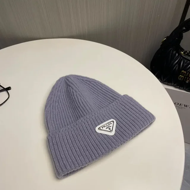 Prada Hats Ribbed knit beanie with triangle logo plaque product detail image 7