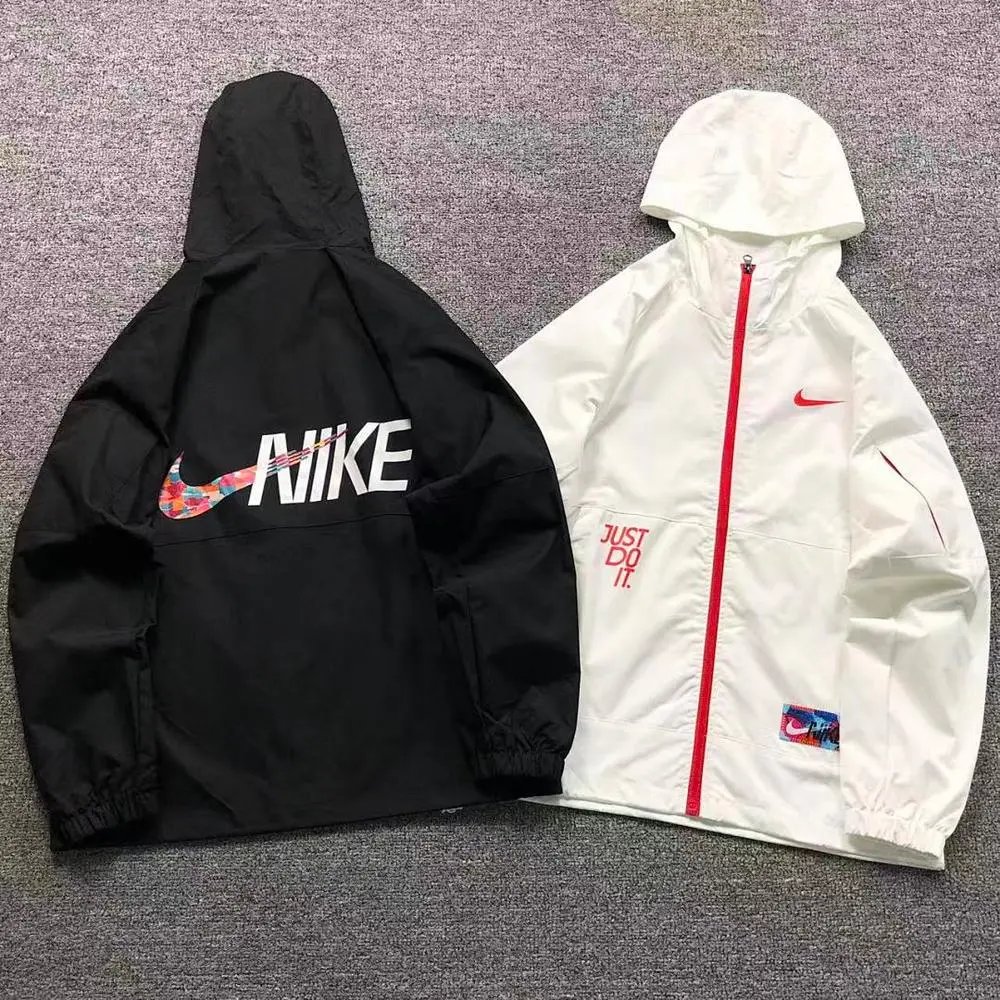 Nike printed logo hooded windbreaker jacket — W2CFinds curated find