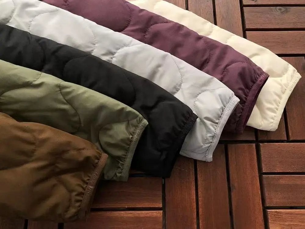 Undefeated Down Jackets Wavy-quilted logo puffer jacket image 8