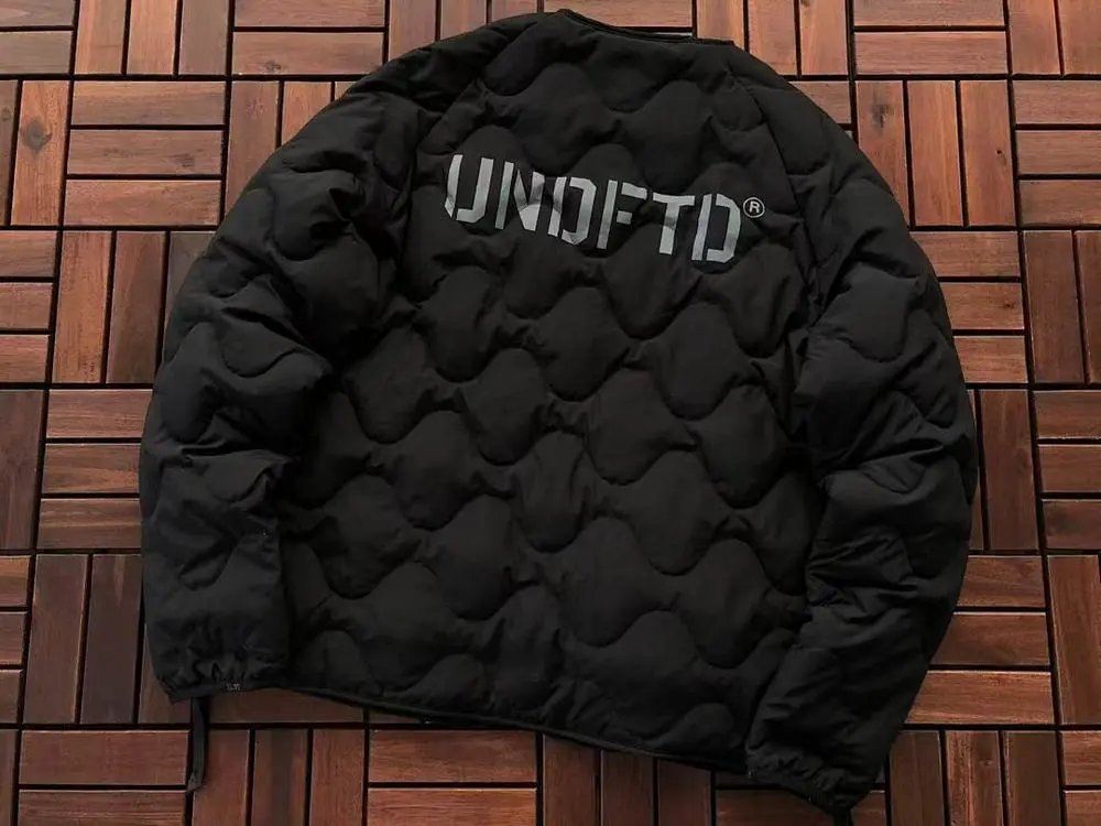 Undefeated Down Jackets Wavy-quilted logo puffer jacket image 7