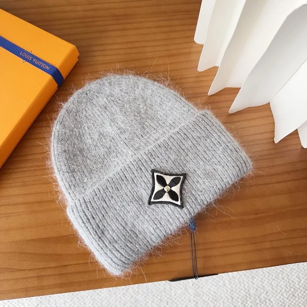 Louis Vuitton Hats Rib-knit cuffed beanie with floral emblem patch — Style 9